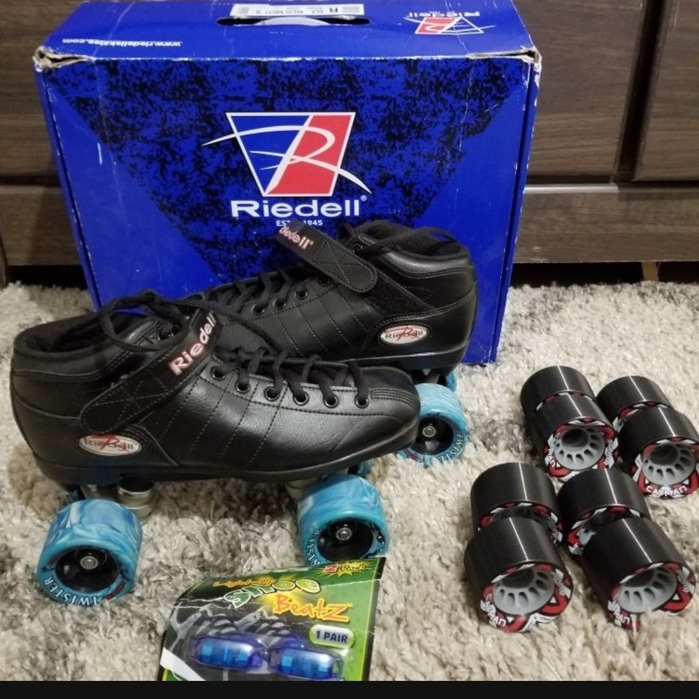 Riedel Black Roller Skates with Blue Wheels